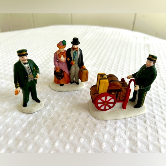 Department 56 “Holiday Travelers” Figurines - Picture 1 of 6
